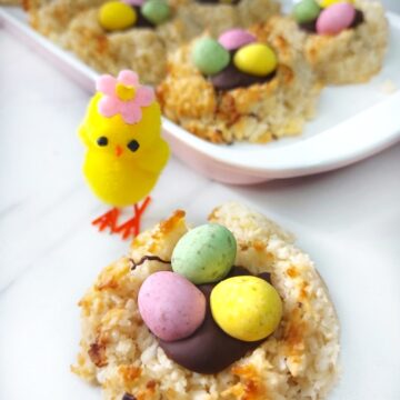 Vegan Coconut Macaroons topped with chocolate and candy eggs