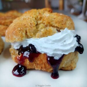 Vegan scone with jam and cream